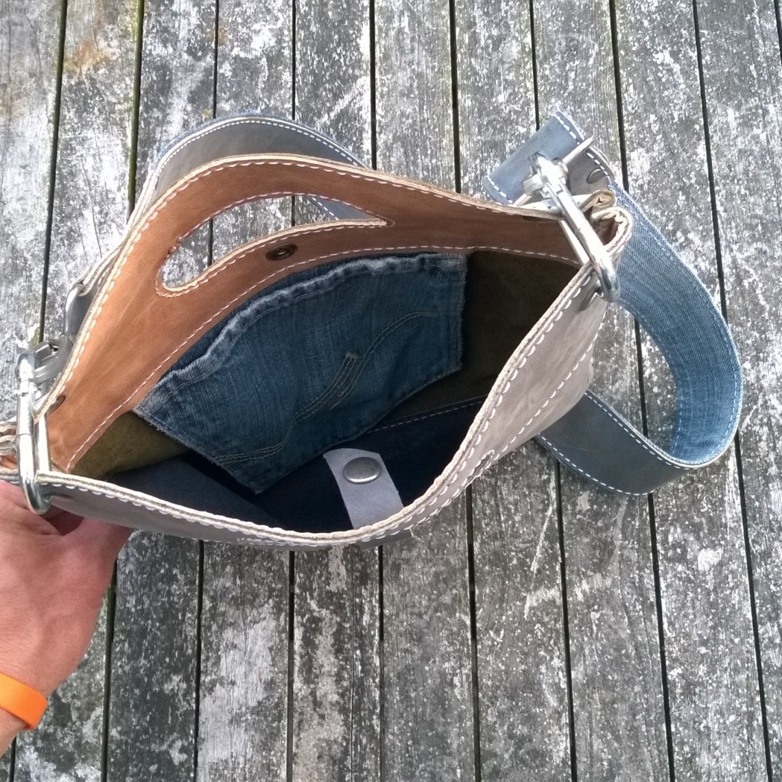Raw leather bag inside