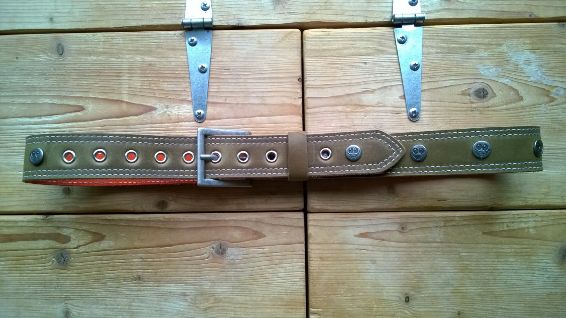 Green leather belt with orange lining